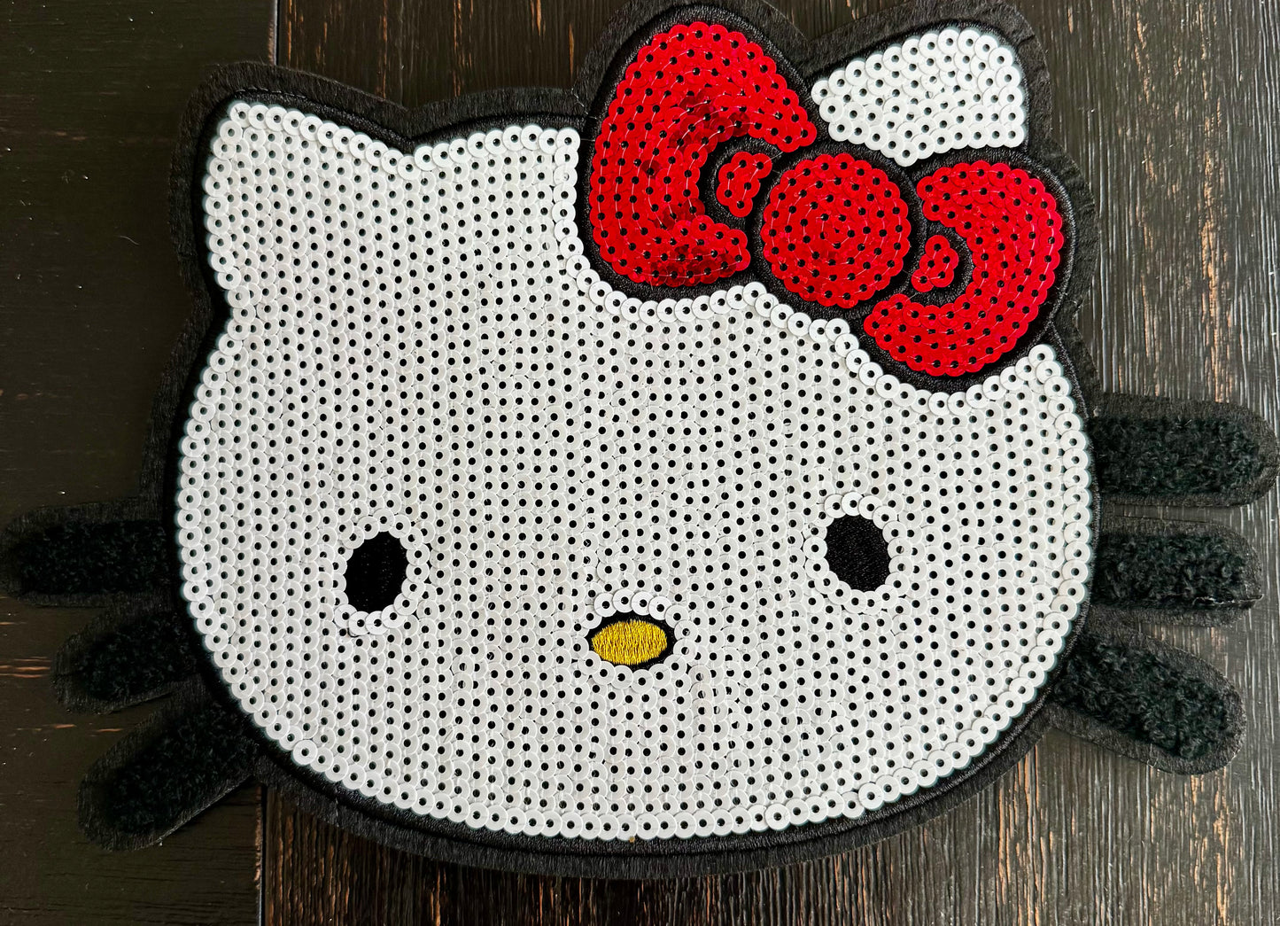 Kitty with red bow sequin patch